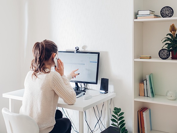 freelancer working from home at desk 